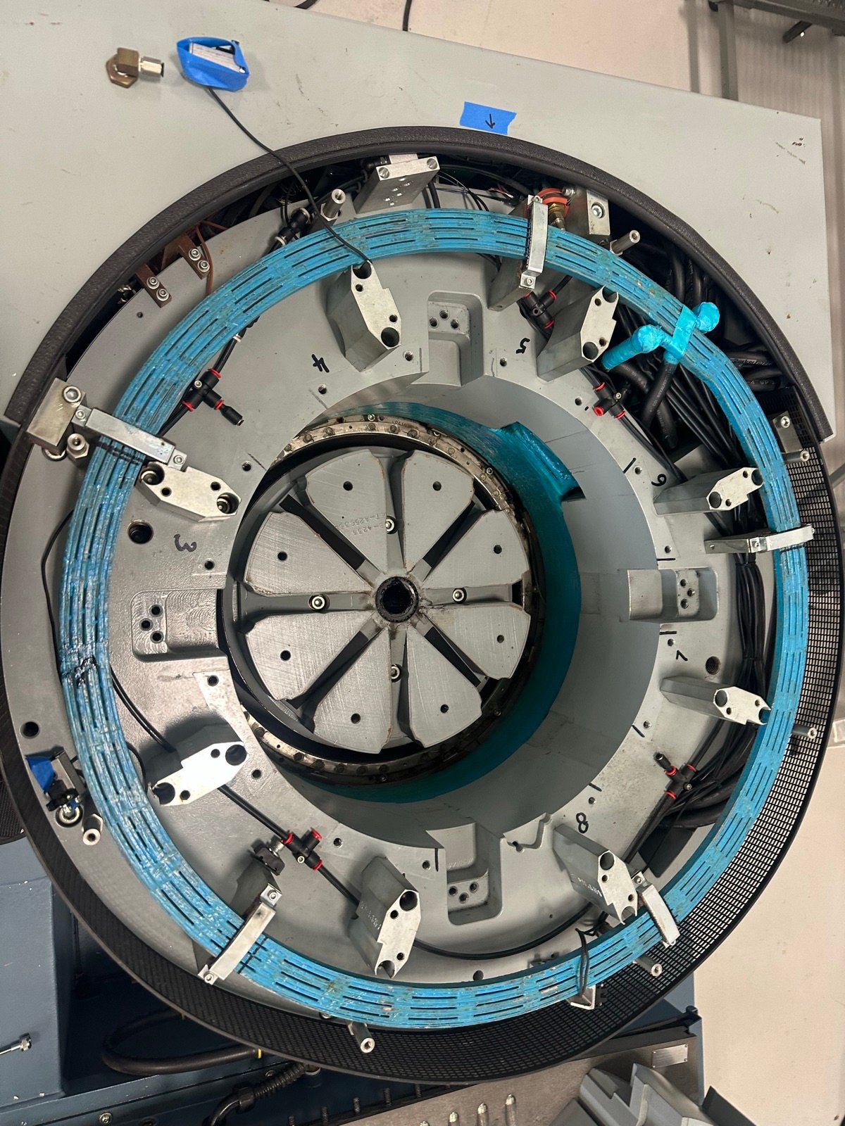 Electrodynamic shaker with cover removed showing armature, degauss coil, and suspension